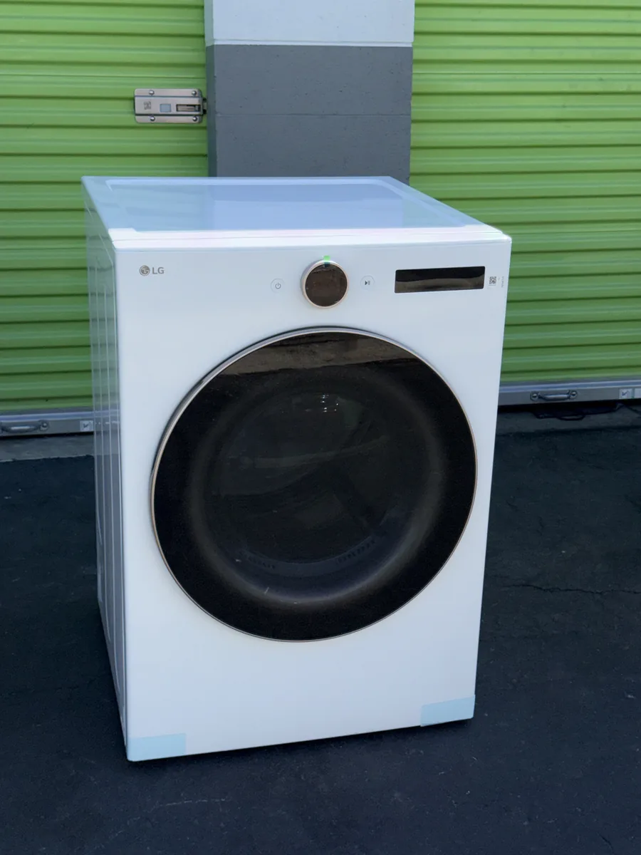 White LG Premium Steam Dryer with rose-gold dial
