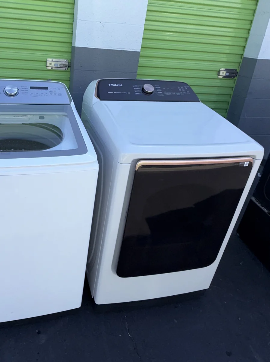 White Samsung steam dryer, angled view